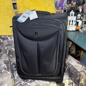 Travelpro Platinum Elite Softside check in spinner 25”